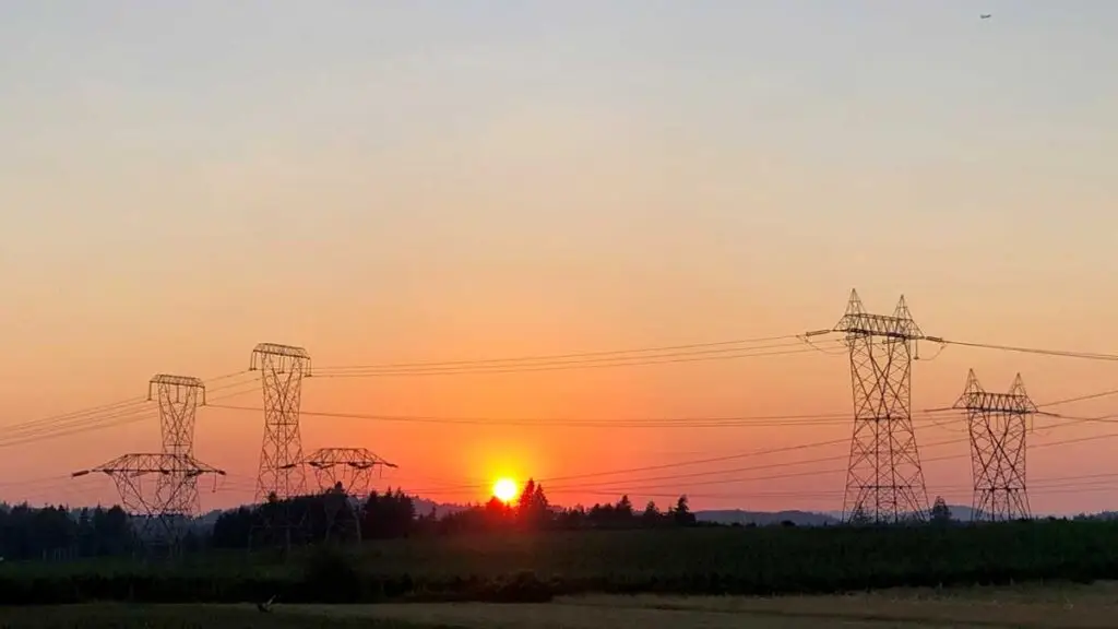 Sunset with powerlines in foreground