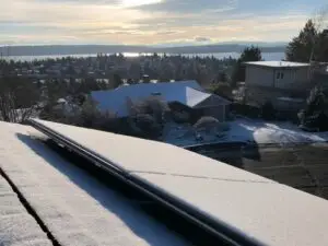 remove snow from solar panels