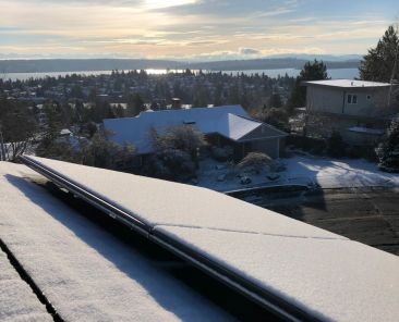 remove snow from solar panels