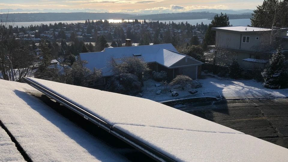 remove snow from solar panels